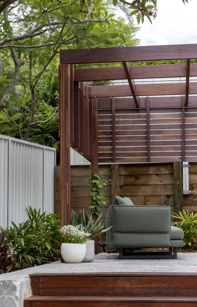 Landscape design and construct project in New Lambton completed with a timber pergola, crazy pave, synthetic turf, and an outdoor entertainment area.