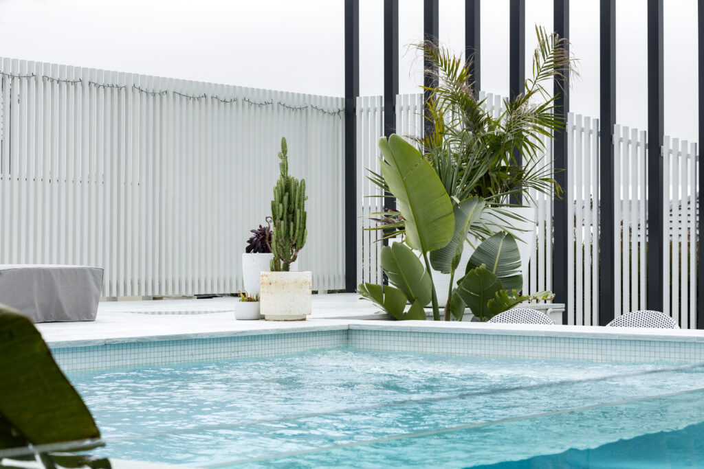 pool-surrounds-landscaping-glass-pool-paving-newcastle-maitland-landscape-construction