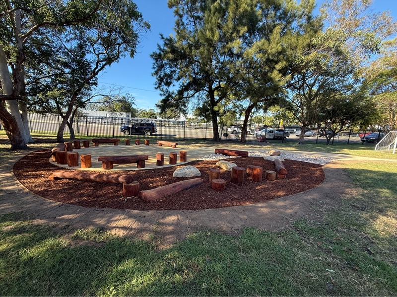 Natural play space design Hamilton North overview showing the completed yarning circle and surrounds