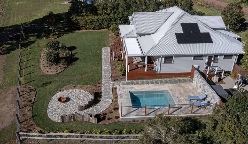 Aerial view of a Pokolbin backyard landscaping project showing pool, firepit and connecting pathway